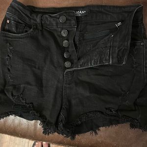 High wasted black ripped up shorts